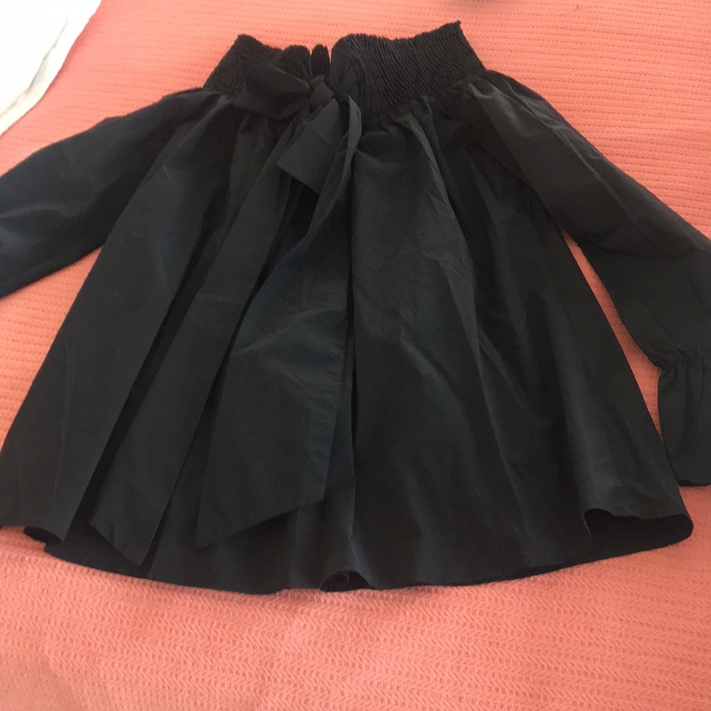 Off shoulder, long sleeved black top